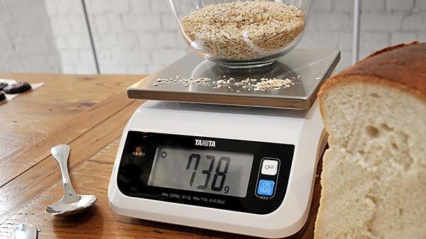 Weighing Flour For Baking With Professional Scales At The